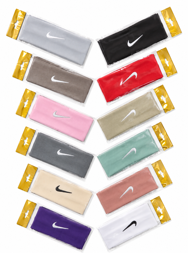 Fabric Nike sports headband in assorted colors for workout and everyday use